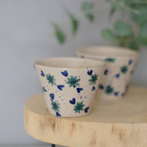 Tiny blue flowers cups